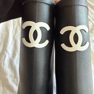 CHANEL Black Boots with White CC Emblem